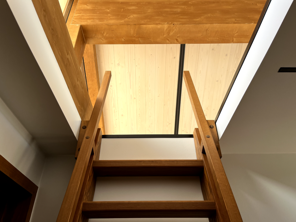 Solid wooden ladder to the loft